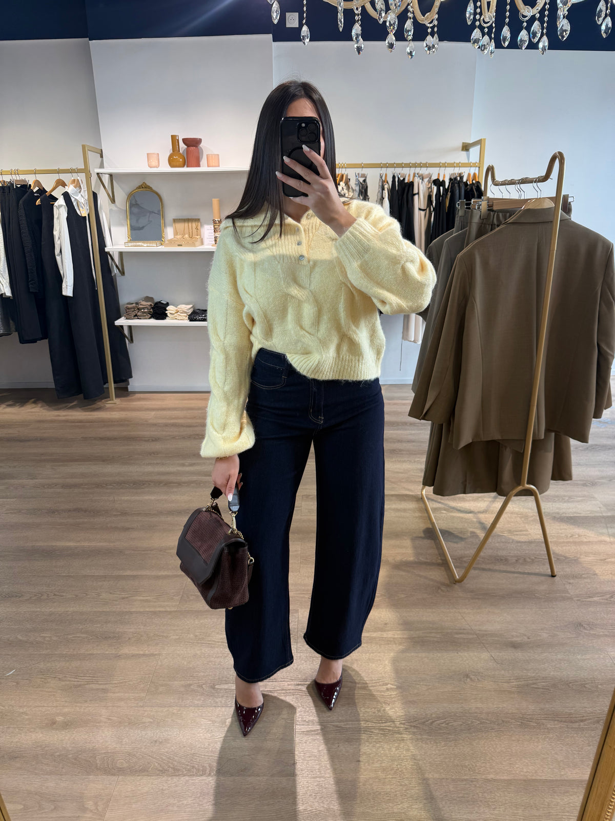 Pull torsadé jaune pâle à col polo