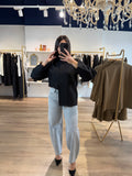 Chemise noire plissée à manches longues